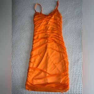 Fashion Nova Orange mini ruched double lined v neck dress Small.